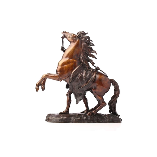 343 - After Guillaume Coustou, a pair of French bronze models of the Marly Horses, unsigned, 44 cm high (2... 