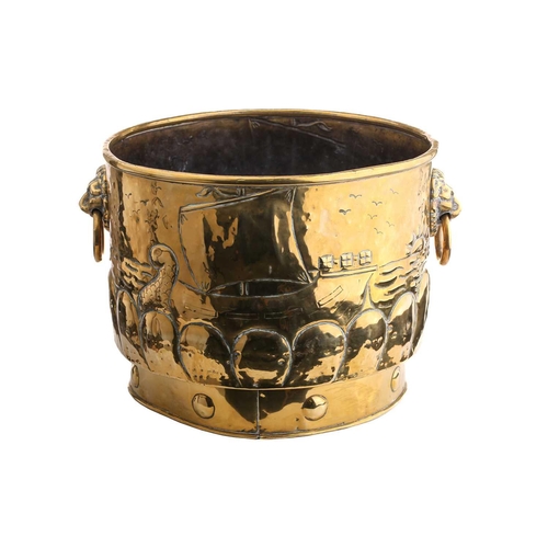 352 - An Arts & Crafts design brass log basket, possibly Glasgow School, the cylindrical bucket with lion ... 