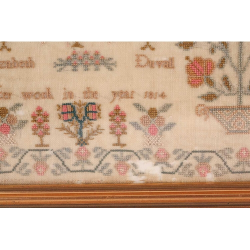 356 - A George III woolwork sampler, with the alphabet over a house surrounded by trees and pots of plants... 