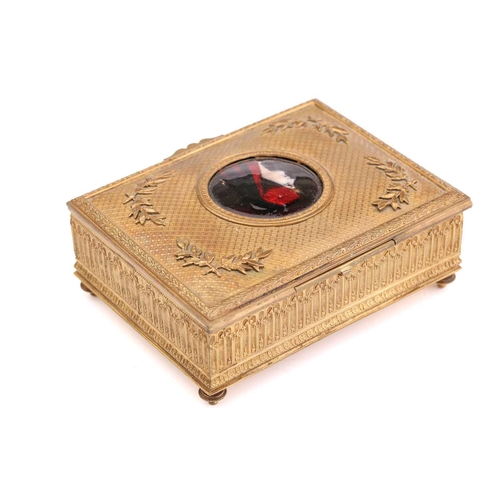 359 - A 19th century French gilt bronze box, set with Limoges enamel plaque depicting a lady in a red head... 