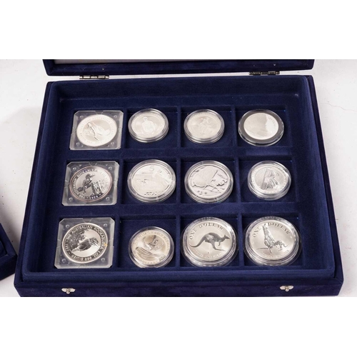 370 - The Official Coins of Australia and The Official Coins of the Royal Canadia Mint a group of twenty f... 