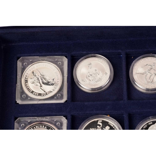 370 - The Official Coins of Australia and The Official Coins of the Royal Canadia Mint a group of twenty f... 