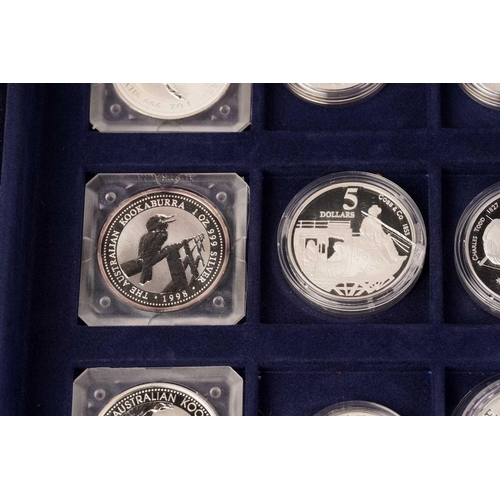 370 - The Official Coins of Australia and The Official Coins of the Royal Canadia Mint a group of twenty f... 