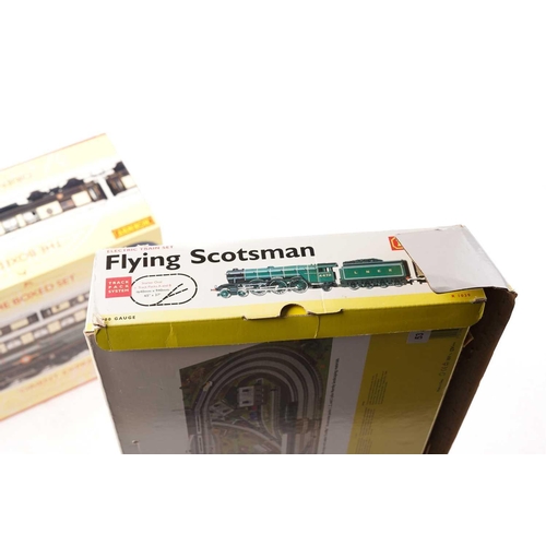 395 - A Hornby 'Orient Express' Boxed Set, unused, together with a part set, Hornby 1039 Flying Scotsman (... 