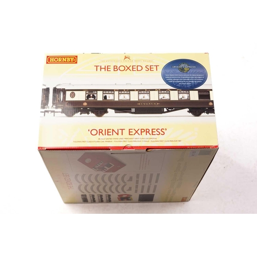 395 - A Hornby 'Orient Express' Boxed Set, unused, together with a part set, Hornby 1039 Flying Scotsman (... 