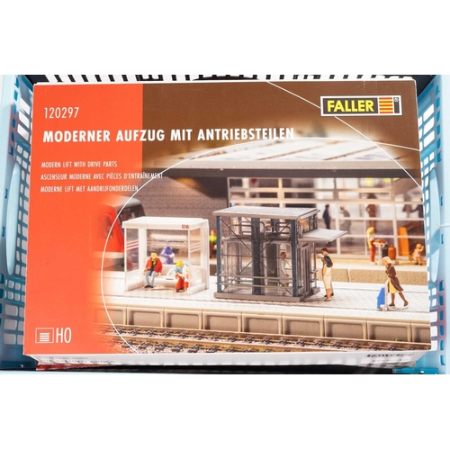 411 - A large collection of boxed Faller model railway trackside building kits, together with Faller Car S... 