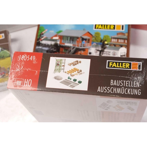 415 - A collection of boxed (and largely sealed) Faller HO Gauge model railway building kits, comprising n... 