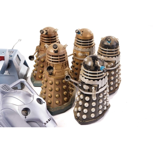 416 - A group of unboxed and playworn Dr Who toys, to include Daleks, K9 and Cybermen masks.