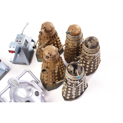 416 - A group of unboxed and playworn Dr Who toys, to include Daleks, K9 and Cybermen masks.