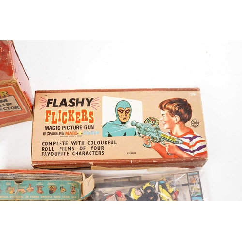 418 - A mixed collection of vintage toys, to include a boxed Stip Master Film Strip Projector, a 'Flashy F... 