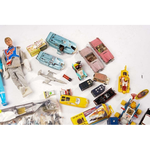 426 - A large collection of late 20th century loose toys, to include 1960s 'James Bond' character figures,... 