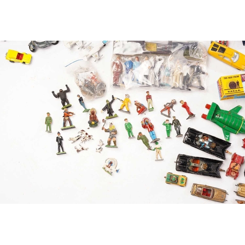 426 - A large collection of late 20th century loose toys, to include 1960s 'James Bond' character figures,... 