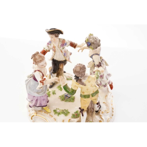 429 - A Meissen figure group of four dancing children, incised 2428 impressed 76, cross swords mark, 15 cm... 