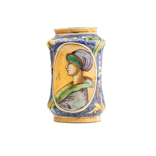 436 - An Albarello dry drug jar, of waisted form, with figural yellow panels within floral scroll borders ... 