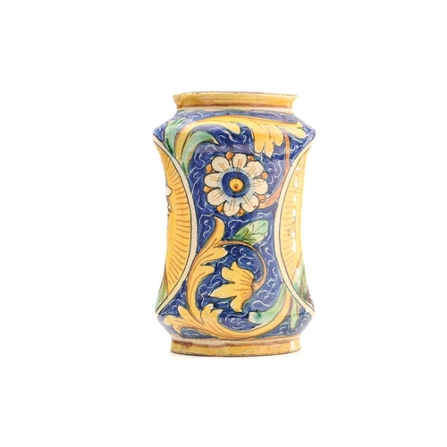 436 - An Albarello dry drug jar, of waisted form, with figural yellow panels within floral scroll borders ... 