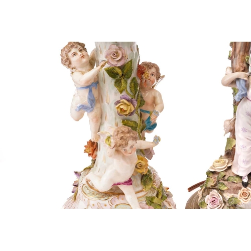 439 - A pair of late 19th-century Continental porcelain figural table lamps ,one mounted with a young gall... 