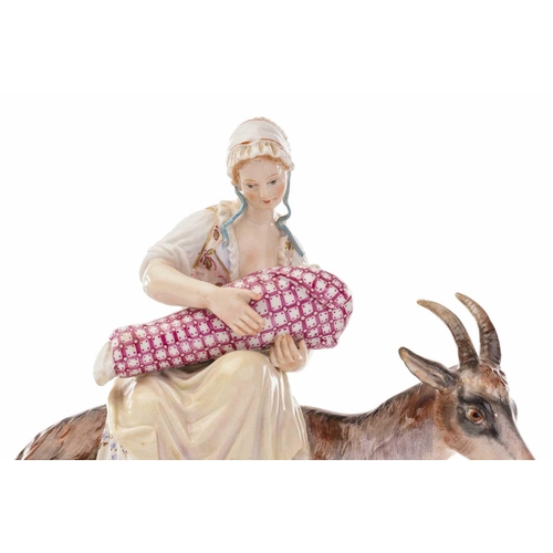 443 - A Meissen figure of the Welsh Tailor`s wife riding goat, the baby and kid feeding from their mother'... 