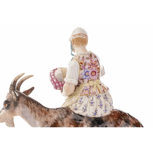 443 - A Meissen figure of the Welsh Tailor`s wife riding goat, the baby and kid feeding from their mother'... 