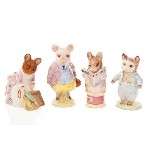 451 - Fifteen Beswick Beatrix Potter figures, a Beswick figure of Rupert Bear and a Kitty MacBride Beswick... 