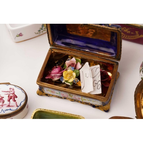 453 - A collection of trinket and pill boxes, including Limoges, Halcyon Days, Crown Staffordshire and oth... 