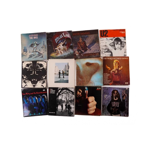 385 - A large collection of empty vinyl cover sleeves including Stevie Wonder - Talking Book, Billy Connol... 