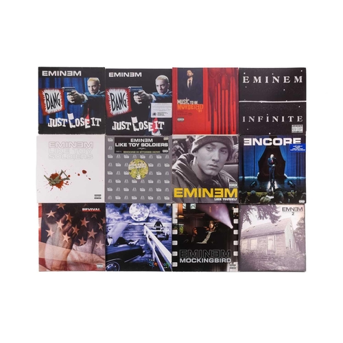 158 - Eminem: thirty-two original vinyl records, comprising 