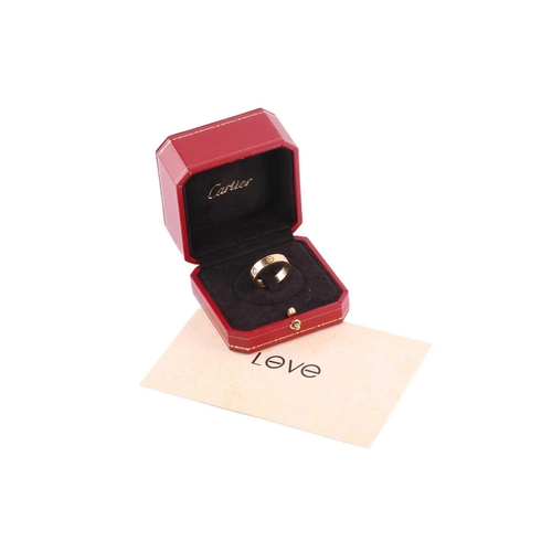 1 - Cartier - 'Love' ring, the polished band set with three brilliant-cut diamonds, and further decorate... 