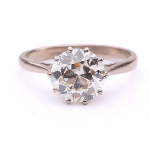 101 - A diamond solitaire ring, featuring a slightly tinted Old-European cut diamond of 8.7 x 8.7 x 5.3 mm... 