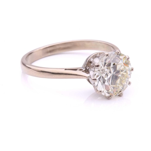 101 - A diamond solitaire ring, featuring a slightly tinted Old-European cut diamond of 8.7 x 8.7 x 5.3 mm... 