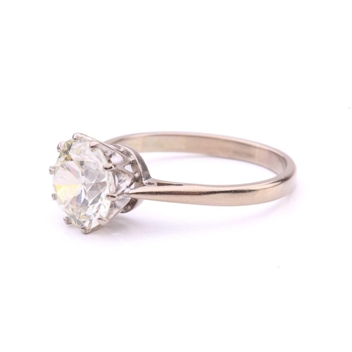 101 - A diamond solitaire ring, featuring a slightly tinted Old-European cut diamond of 8.7 x 8.7 x 5.3 mm... 