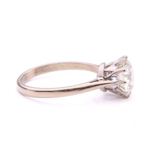 101 - A diamond solitaire ring, featuring a slightly tinted Old-European cut diamond of 8.7 x 8.7 x 5.3 mm... 