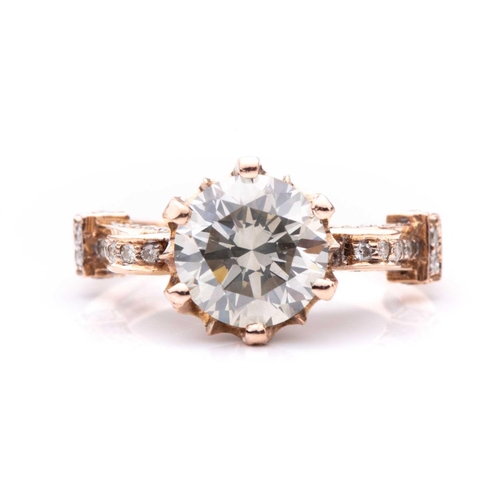 105 - A diamond dress ring, featuring a 2.70ct round brilliant-cut diamond in the centre, in a high-profil... 