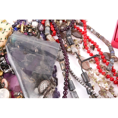 111 - A mixed collection of costume jewellery and other items including a tumbled amethyst bead necklace, ... 