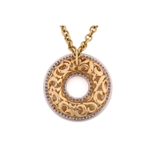 115 - An annular pendant on chain, consisting of a hollow torus with scrollwork designs, embellished with ... 