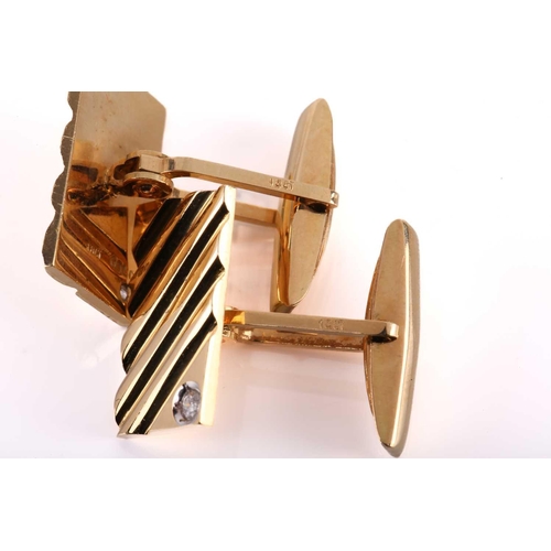 118 - A pair of cufflinks with diamond accents, each comprising a diagonally striated rectangular panel, s... 