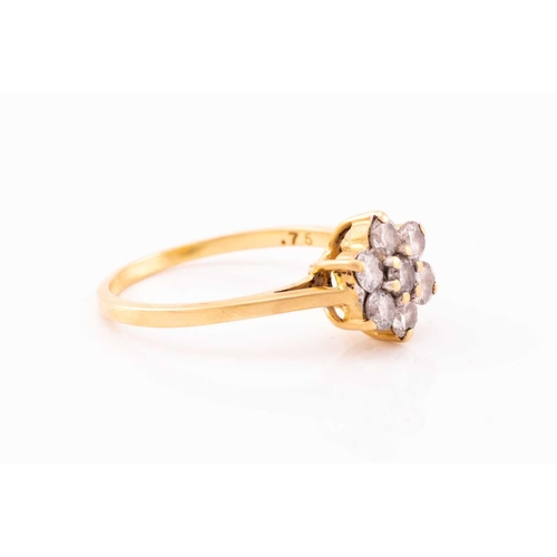 119 - A diamond cluster ring, featuring seven round brilliant cut diamonds claw set into 18ct yellow gold ... 