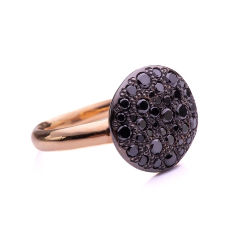 12 - Pomellato - 'Sabbia' ring set with treated black diamonds, ring head comprising a round textured pan... 