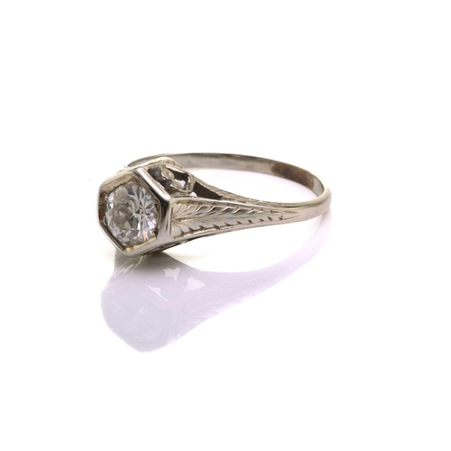 128 - A diamond solitaire ring, scintillating with an Old-European cut diamond of 5.4 x 5.4 x 3.25 mm, in ... 