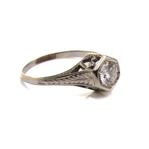 128 - A diamond solitaire ring, scintillating with an Old-European cut diamond of 5.4 x 5.4 x 3.25 mm, in ... 