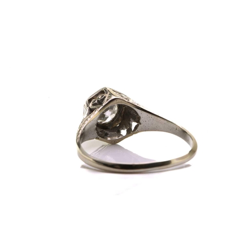 128 - A diamond solitaire ring, scintillating with an Old-European cut diamond of 5.4 x 5.4 x 3.25 mm, in ... 