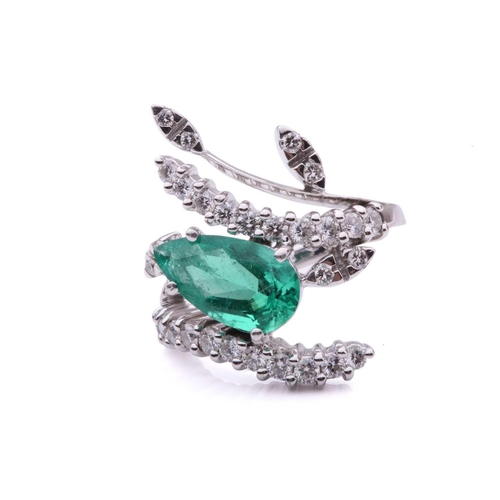 137 - An emerald and diamond cocktail ring, featuring a pear-shaped emerald with bright bluish-green body ... 