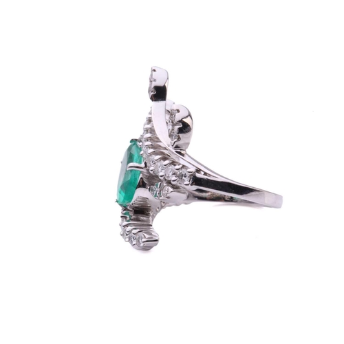 137 - An emerald and diamond cocktail ring, featuring a pear-shaped emerald with bright bluish-green body ... 