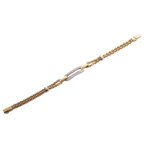 140 - A two-tone bracelet set with diamonds, containing an elongated double bar pavé set with circular-cut... 