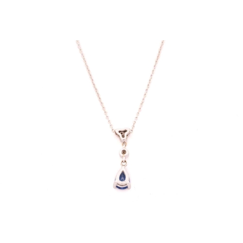 15 - A sapphire and diamond necklace and earrings en-suite; the necklace comprises a pear-shaped sapphire... 