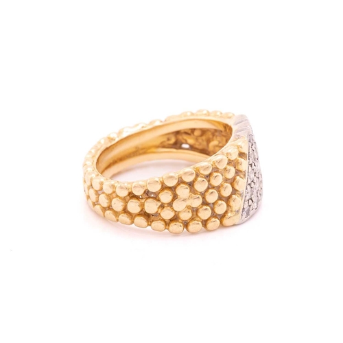 150 - A dress ring with a stripe of 15 pave set diamonds on a textured bead band measuring 10mm tapering d... 