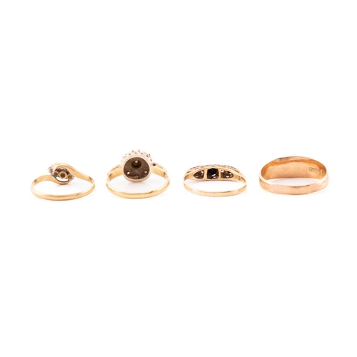 151 - A collection of seven rings, comprising of a three-stone ring set into yellow metals stamped 18ct, a... 