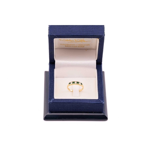 169 - An emerald and diamond pendant necklace and an emerald and diamond ring set in 18ct gold, the ring c... 