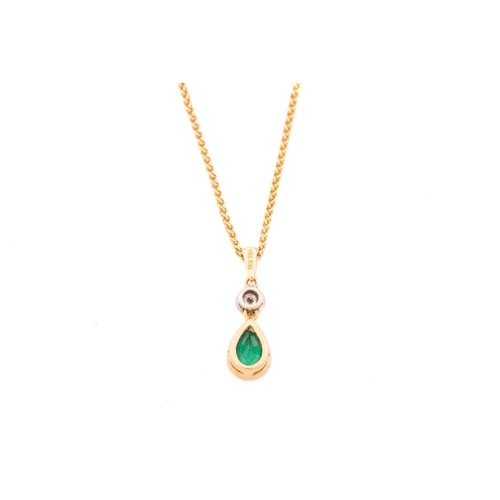 169 - An emerald and diamond pendant necklace and an emerald and diamond ring set in 18ct gold, the ring c... 