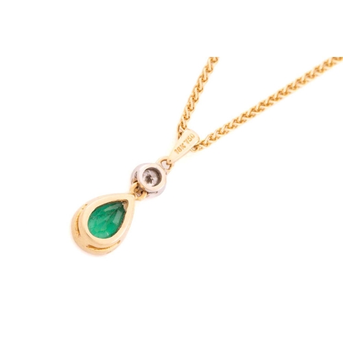 169 - An emerald and diamond pendant necklace and an emerald and diamond ring set in 18ct gold, the ring c... 