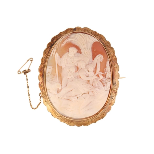 18 - A large Victorian shell cameo brooch with a biblical scene, depicting The Holy Family in a landscape... 